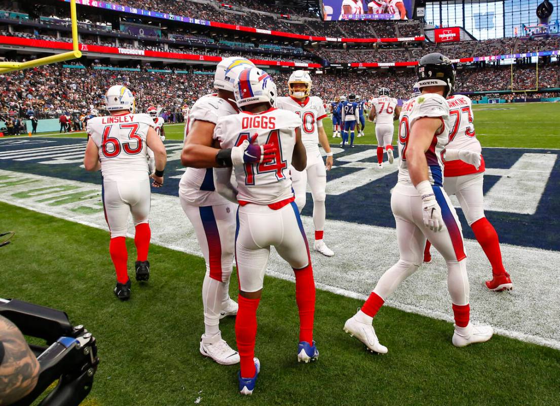 AFC wide receiver Stefon Diggs of the Buffalo Bills (14) celebrates his touchdown with teammate ...