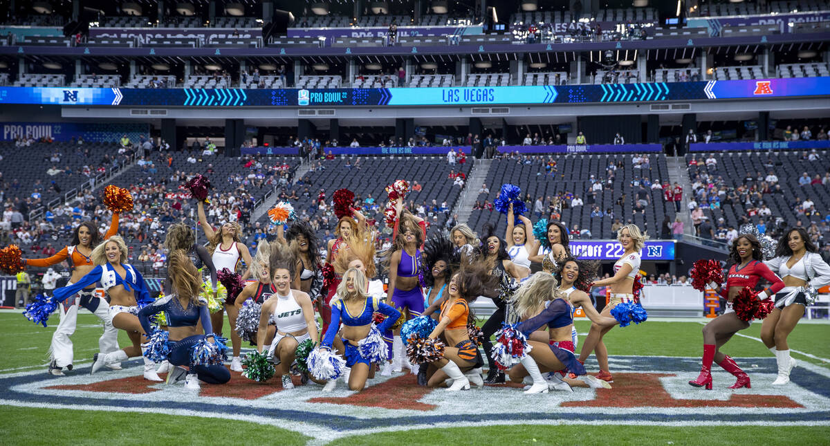 Cheerleaders scramble into position for a group shot during the first half of the Pro Bowl at A ...