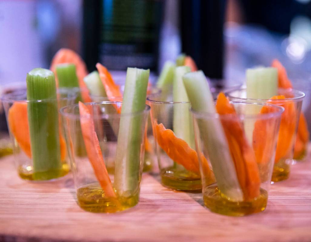 Samples of carrots and celery with virgin olive oil from Italy are displayed at at Mazzetti L&# ...