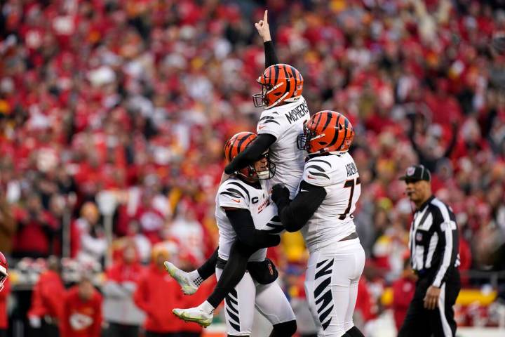 Cincinnati Bengals kicker Evan McPherson (2) celebrates with teammates after kicking a 31-yard ...