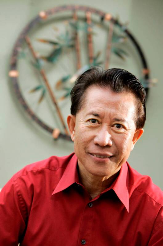 This Jan. 23, 2008 file photo shows longtime celebrity chef Martin Yan as he poses for a photog ...