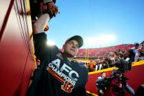 Cincinnati Bengals quarterback Joe Burrow celebrates with fans after the AFC championship NFL f ...