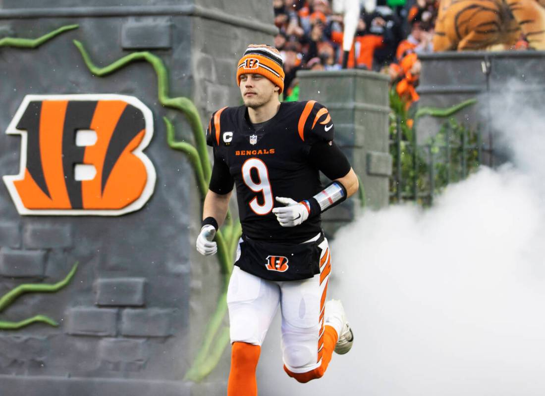 Cincinnati Bengals quarterback Joe Burrow (9) is introduced before the start of an NFL playoff ...