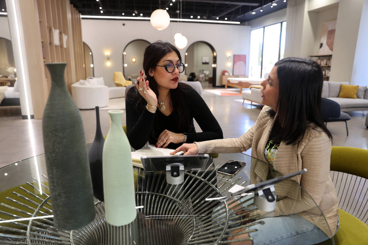 Interior designer Amina El Kadiri, left, works with salesperson Shani Levkovitz at Valyou Furni ...