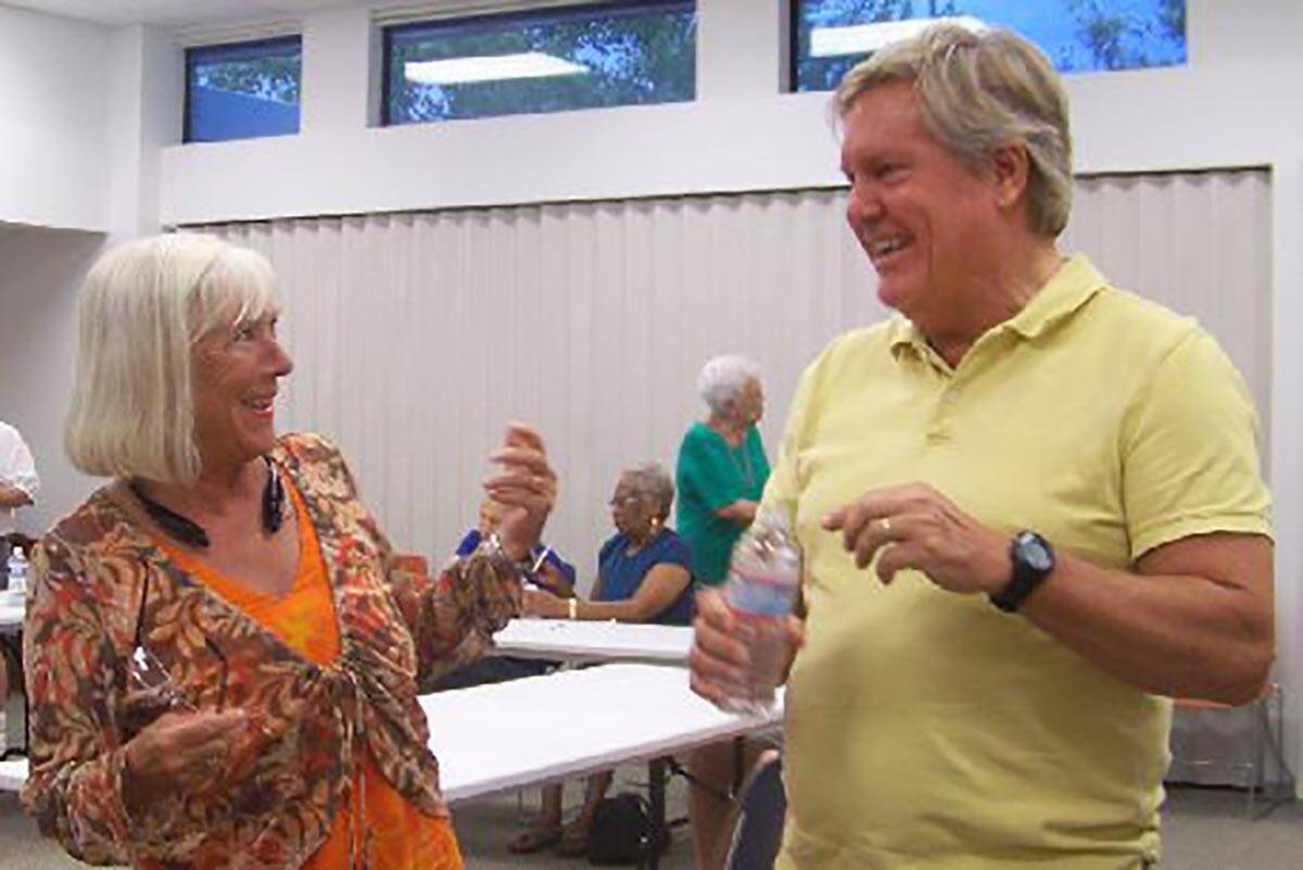 Boulder City Democratic Club Chairwoman Valerie McNay and state Sen. Tick Segerblom share a lau ...