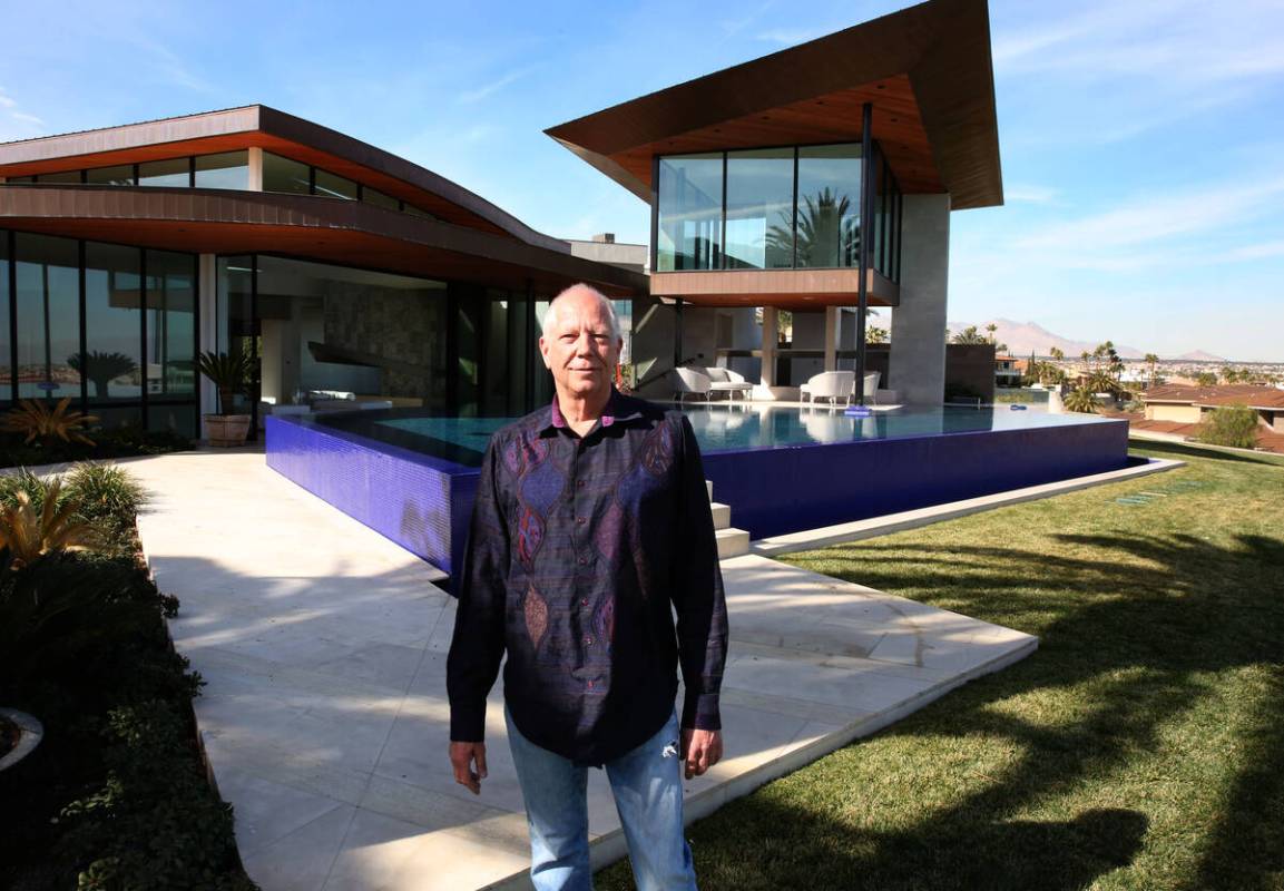 Developer Jim Rhodes poses for a photo at his mansion on Friday, Feb. 1, 2019, in Spanish Hills ...