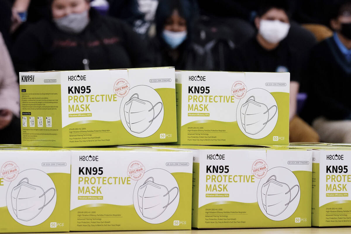 Shown are KN95 protective masks before being distributed to students at Camden High School in C ...