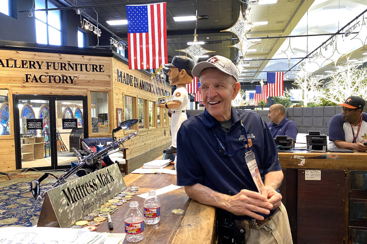 Houston furniture store owner Jim "Mattress Mack" McIngvale, 68, mans the counter in ...