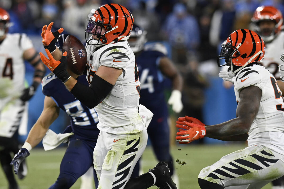 Cincinnati Bengals linebacker Logan Wilson (55) intercepts the ball against the Tennessee Titan ...