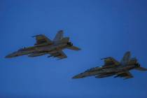 US Navy fighter jets fly during the visit of NATO Secretary General Jens Stoltenberg at the Mih ...