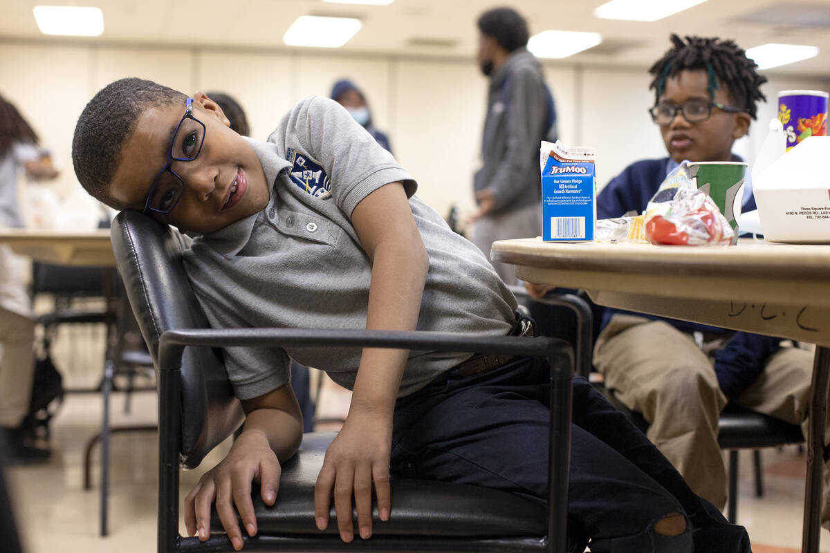 Jeremy Smith goofs off during lunch time in the after-school program at Doolittle Community Cen ...
