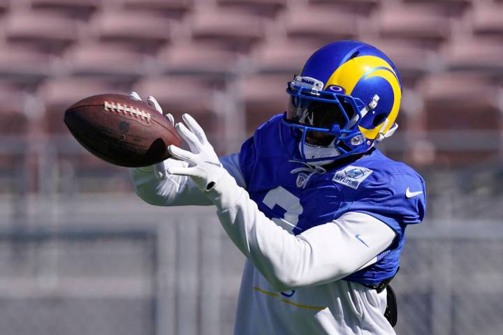 Los Angeles Rams wide receiver Odell Beckham Jr. catches a pass during practice for an NFL Supe ...