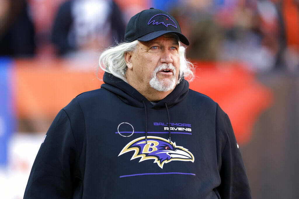 Baltimore Ravens inside linebackers coach Rob Ryan walks out to the field before an NFL footbal ...