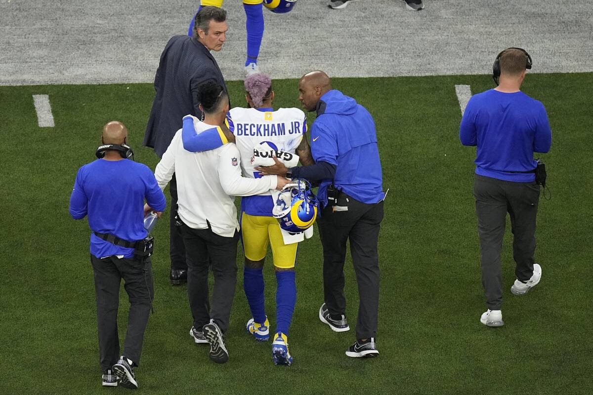 Los Angeles Rams wide receiver Odell Beckham Jr. (3) is assisted off the field during the first ...