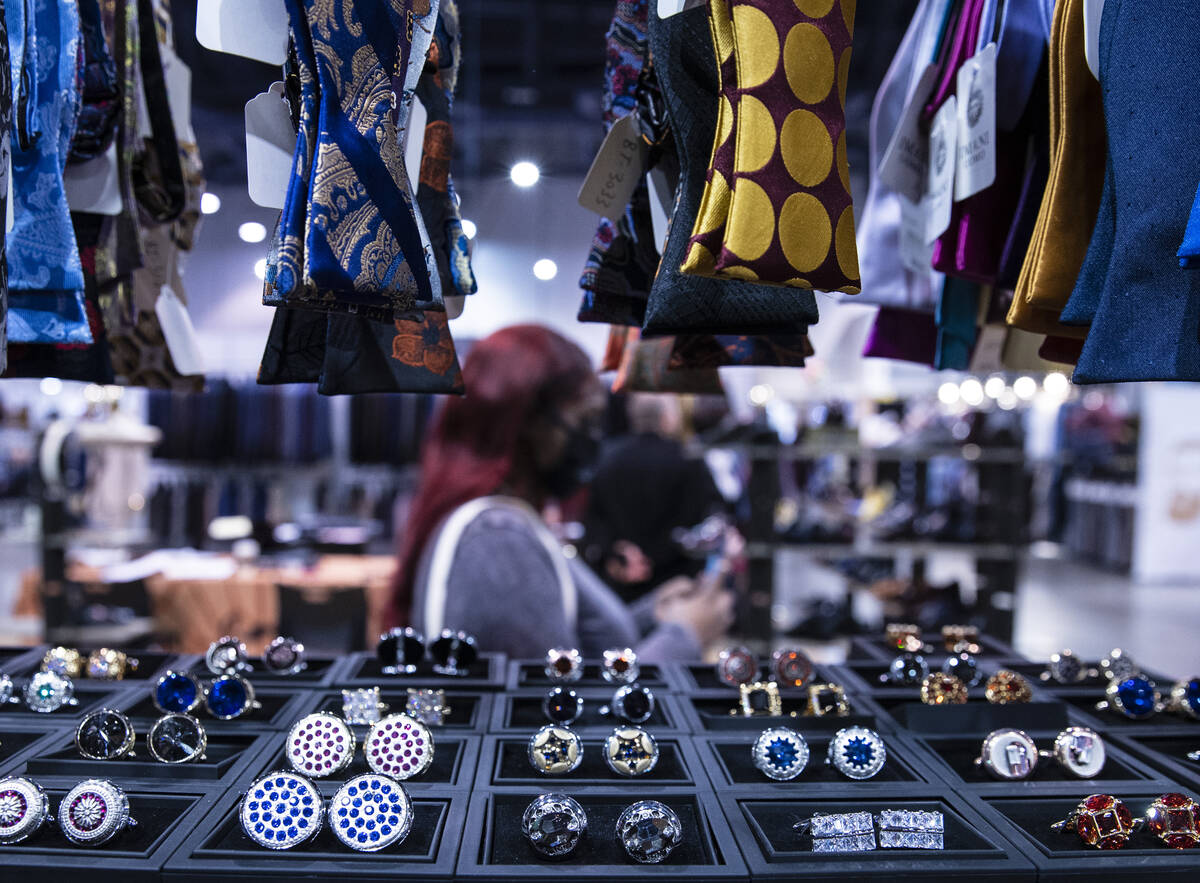 Designer ties and shirt cuffs are displayed at Imani UOMO’s booth during the biannual M ...