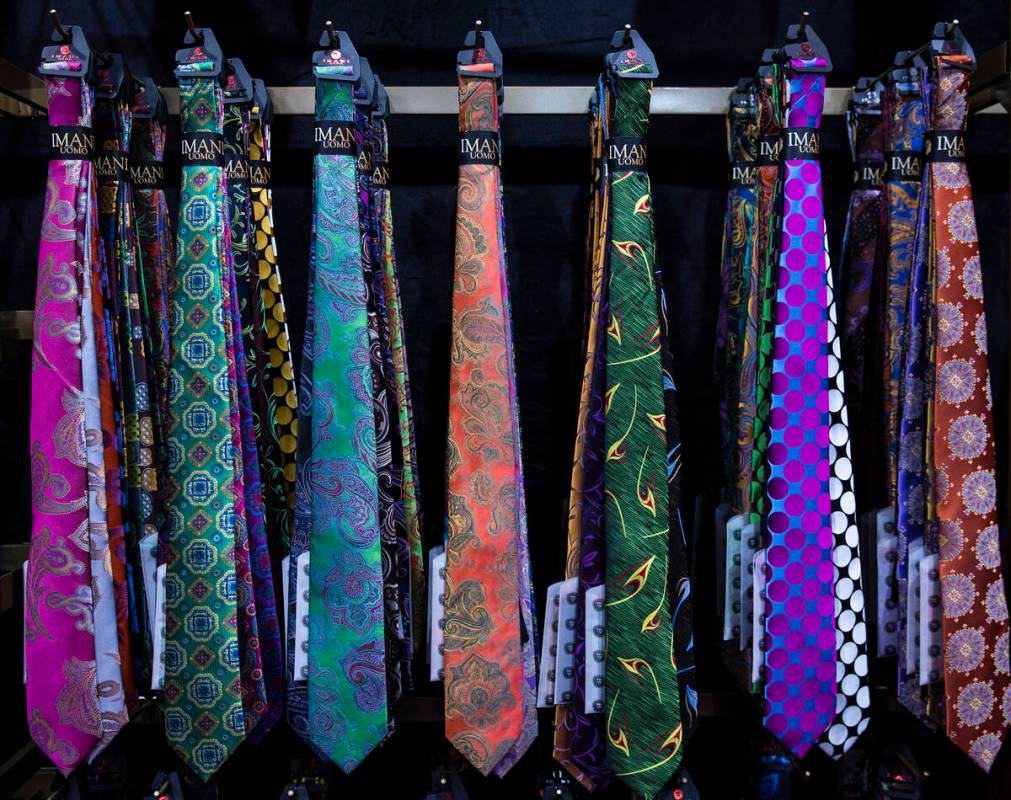 Designer ties at Imani UOMO’s booth are displayed at the biannual MAGIC show, a trend-dr ...