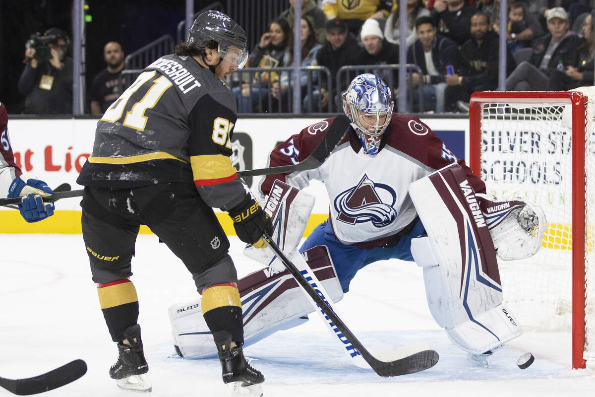 Golden Knights center Jonathan Marchessault (81) shoots on Colorado Avalanche goaltender Darcy ...