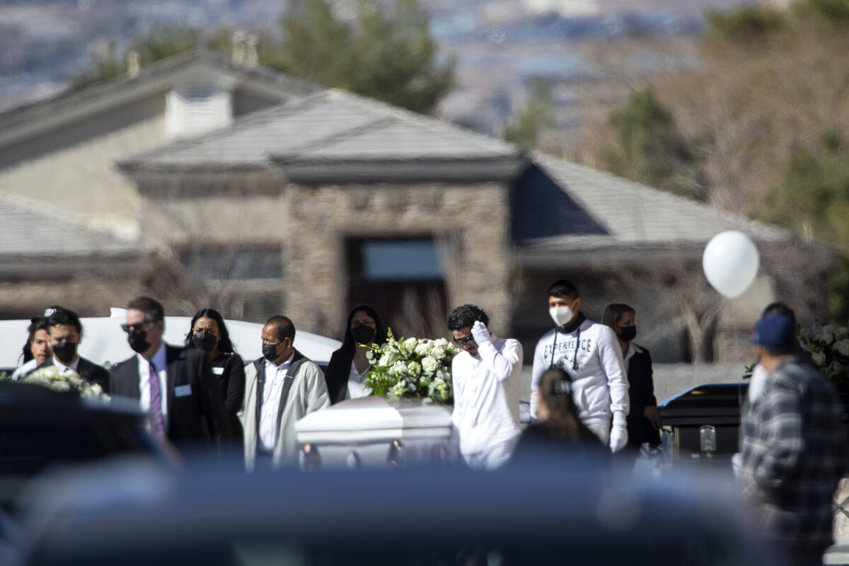 Attendees of the memorial service for the Zacarias family, 7 of whom were killed in a North Las ...