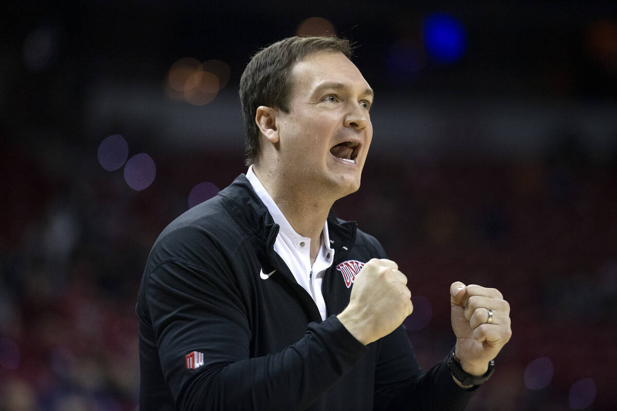 UNLV Rebels head coach Kevin Kruger shouts from the sidelines after UNLV Rebels forward Royce H ...