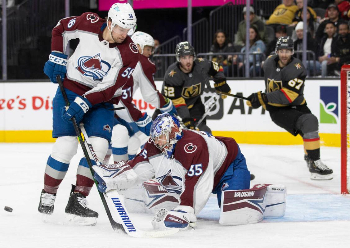 Colorado Avalanche goaltender Darcy Kuemper (35) makes a save against Golden Knights left wing ...