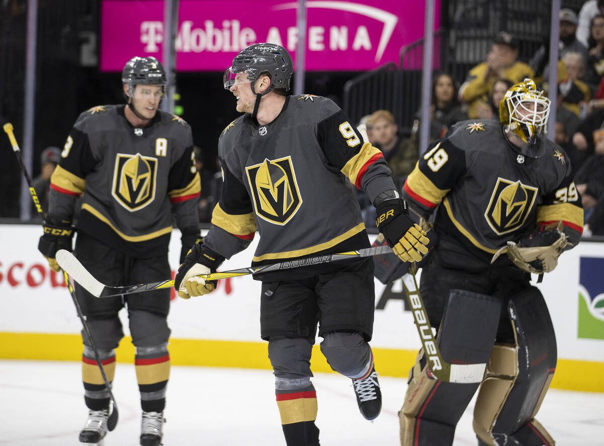 Golden Knights center Jack Eichel (9) winces after defending a shot on goal in the second perio ...