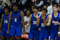 Bishop Gorman players reacts to a play against Liberty High during Platinum Division boys baske ...