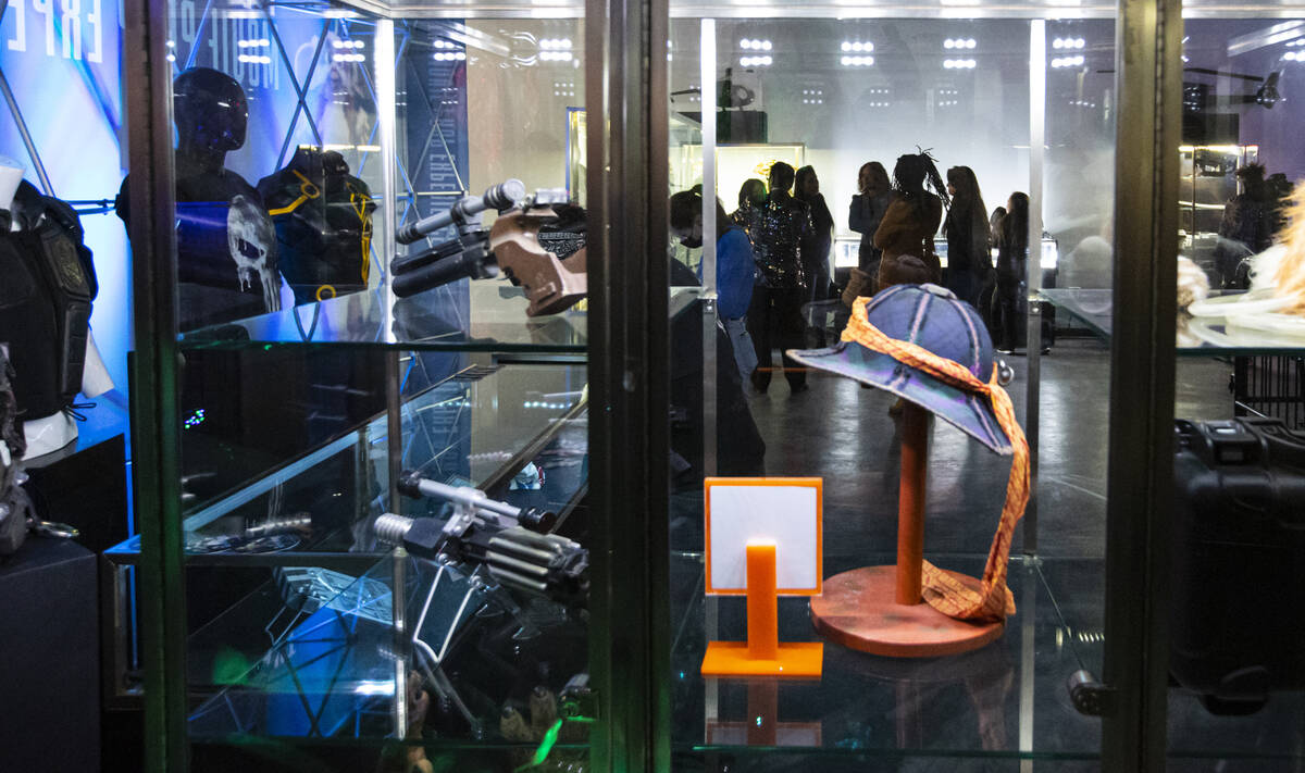 People explore The Movie Prop Experience during a preview at Neonopolis on Fremont Street Thurs ...