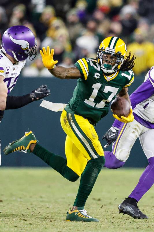 Green Bay Packers wide receiver Davante Adams (17) runs after a catch during an NFL football ga ...