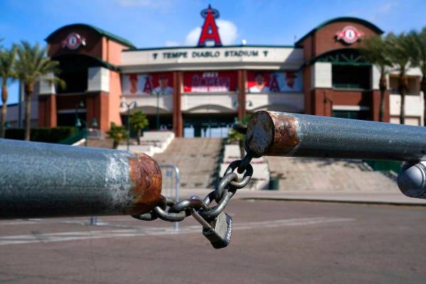 The main parking lot at the Los Angeles Angels Tempe Diablo Stadium remains closed as pitchers ...