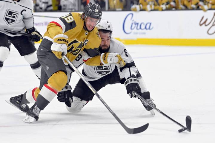 Vegas Golden Knights right wing Reilly Smith (19) and Los Angeles Kings defenseman Drew Doughty ...