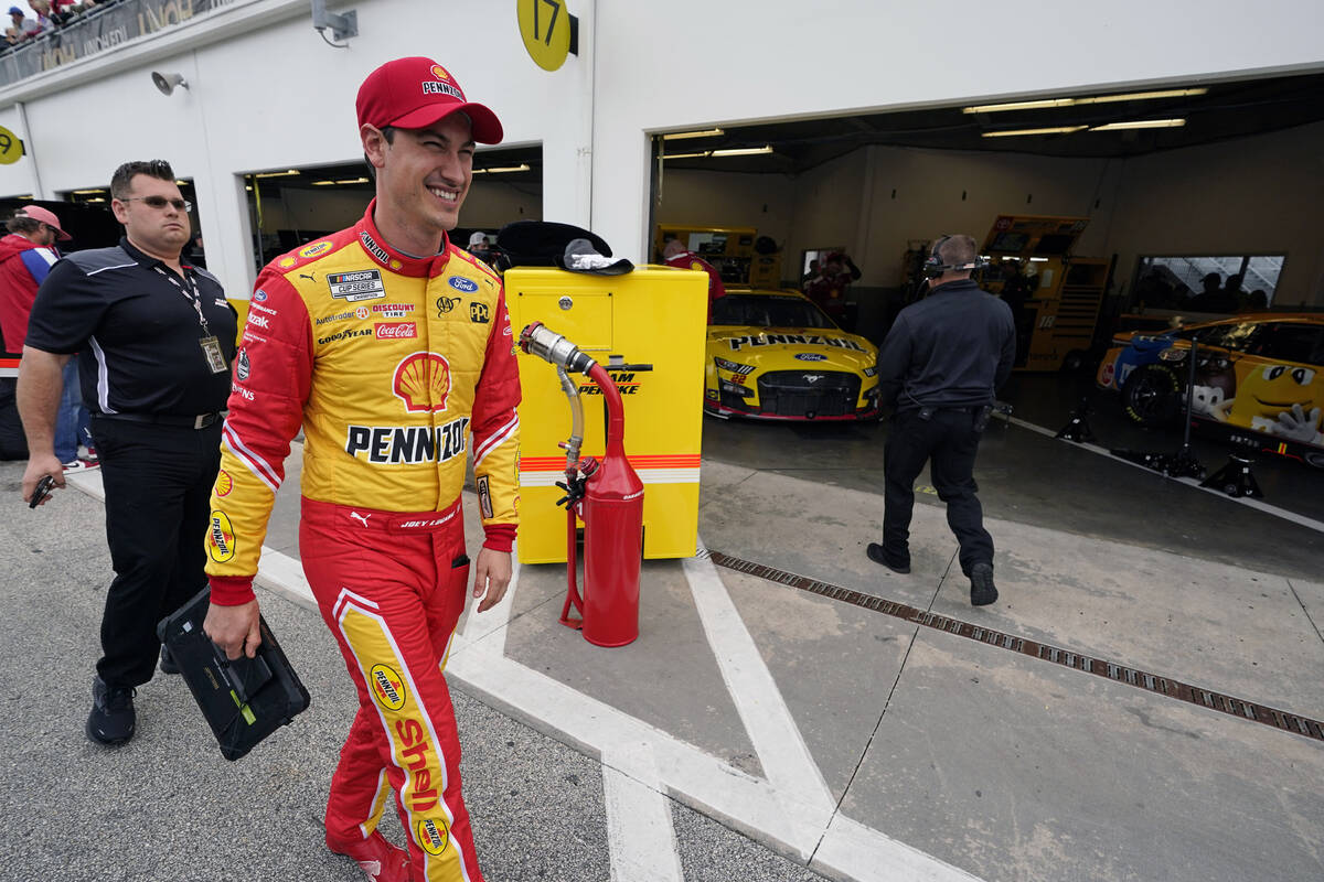 Joey Logano in the garage area during NASCAR auto race practice at Daytona International Speedw ...