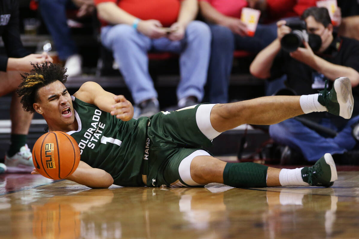 Colorado State’s John Tonje (1) takes a fall while on offense against UNLV in the second ...