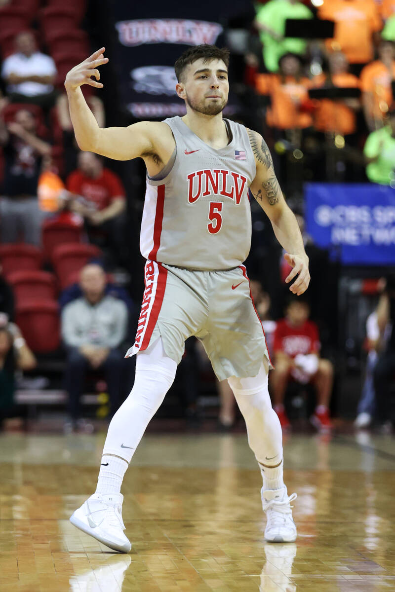 UNLV’s Jordan McCabe (5) gestures after scoring a 3-point-shot against Colorado State in ...