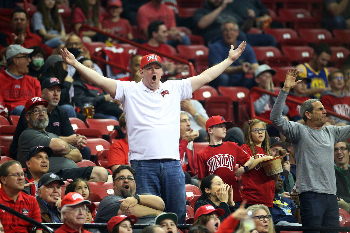 Fans react after a play in the first half on a men’s basketball game between UNLV and Co ...
