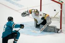 San Jose Sharks center Nick Bonino, left, scores a goal against Vegas Golden Knights goaltender ...