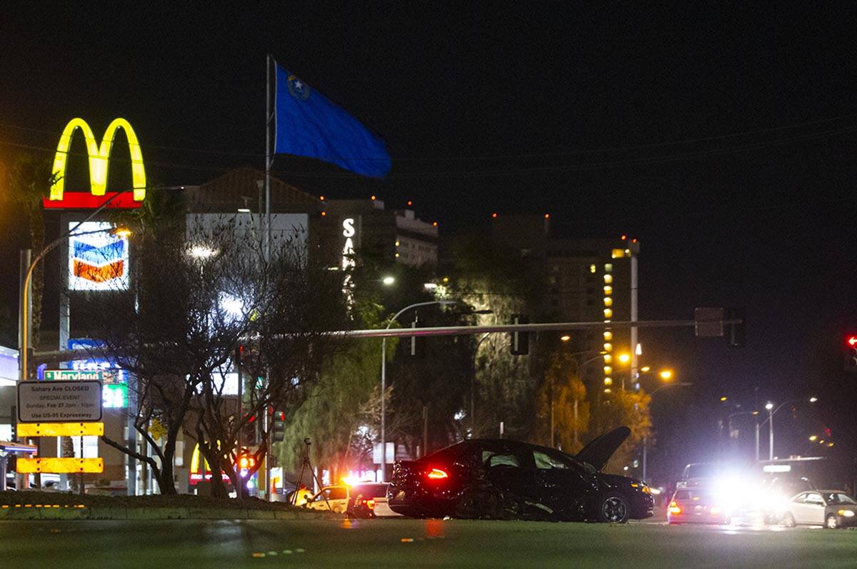 Las Vegas police investigate the scene of a car accident on Sahara Avenue east of Maryland Park ...