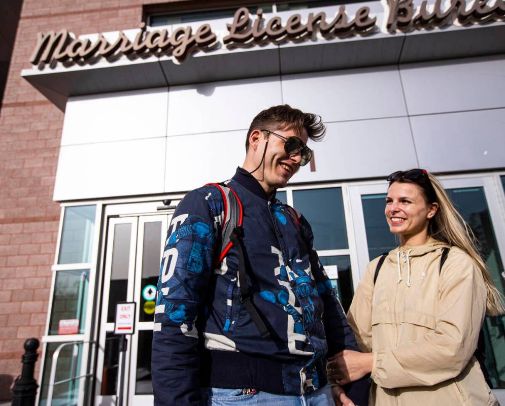 Bernhard, left, and Ivan, of Austria, talk ahead of their wedding at the Clark County Marriage ...