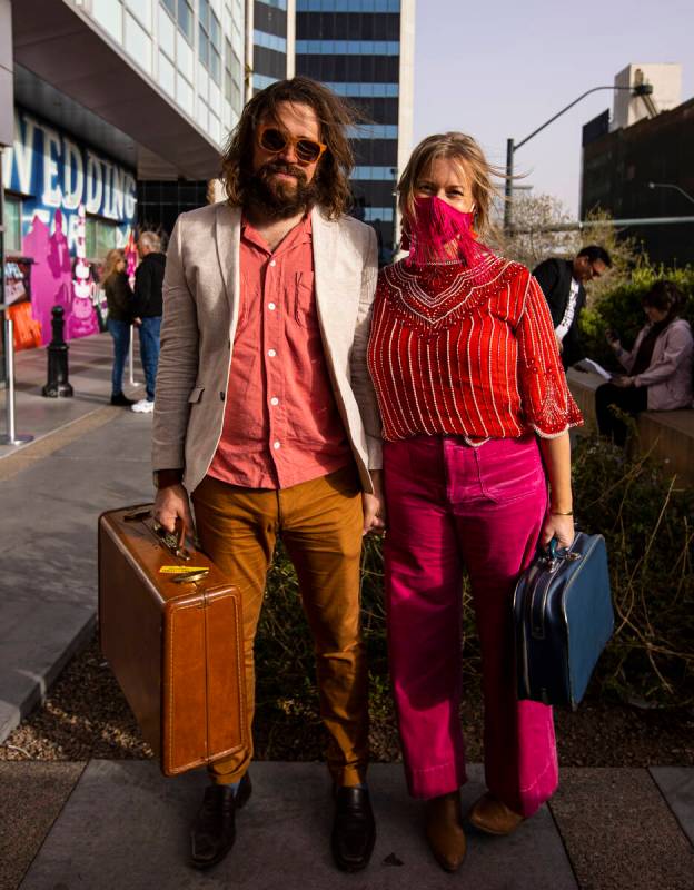 TJ Lemanski, left, and Allison Kissell, of Austin, Texas, pose for a portrait outside of the Cl ...