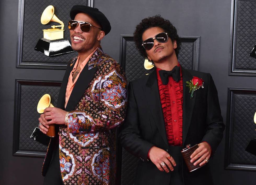 FILE - Anderson .Paak, left, and Bruno Mars, of the duo Silk Sonic, appear at the 63rd annual G ...