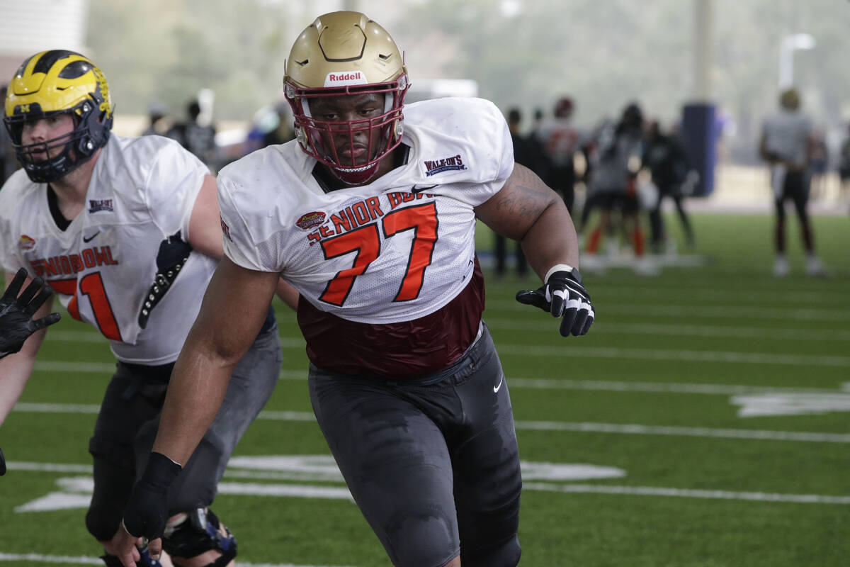 National Team offensive lineman Zion Johnson of Boston College (77) runs through drills during ...