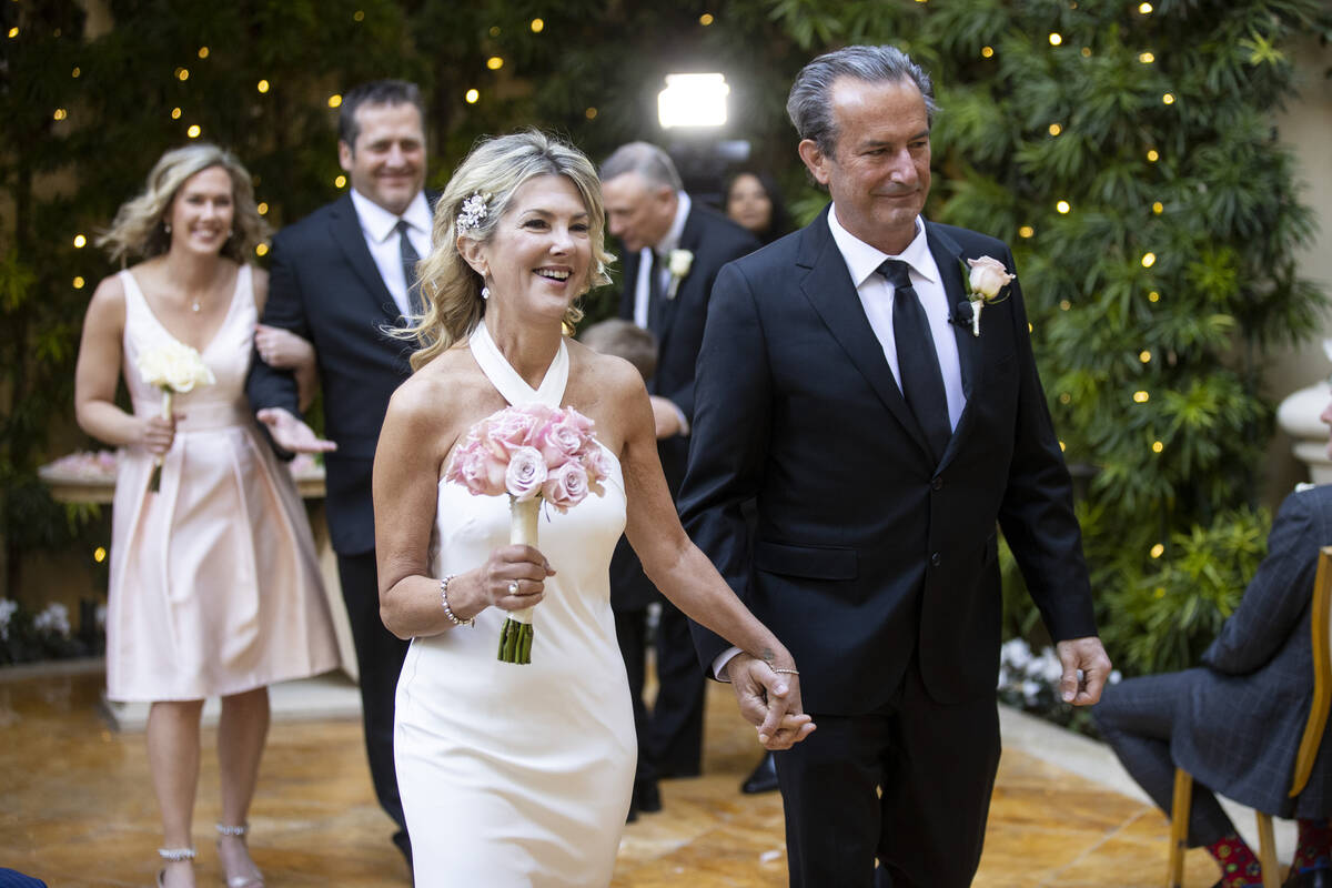 Sheila Daley, left, and her husband James Dunbar, followed by her daughter Katelyn Wadewitz and ...