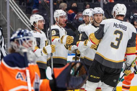 Vegas Golden Knights players celebrate a goal against the Edmonton Oilers during the third peri ...