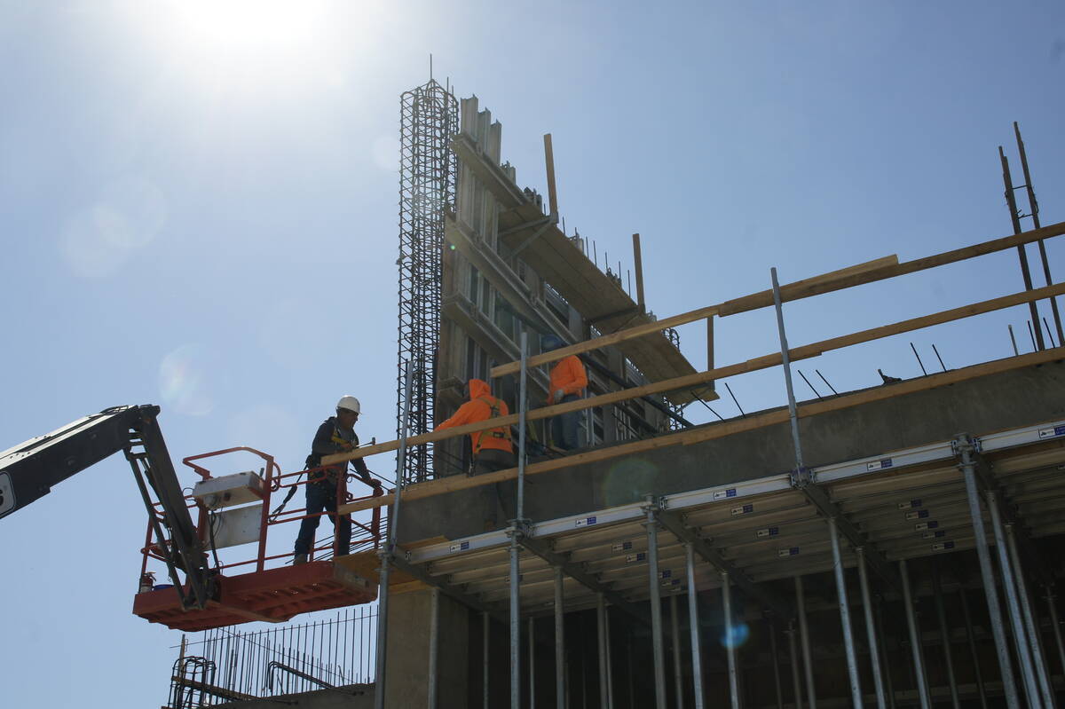 Centennial Subaru Workers set framing for the second-floor columns Centennial Subaru, Southern ...