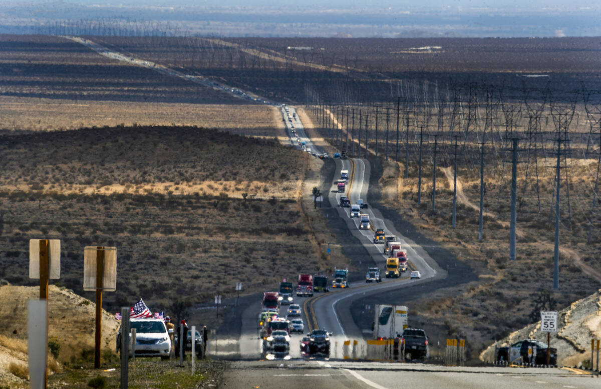 The People’s Convoy make their way north along the I-395 near Boron, California, headed ...