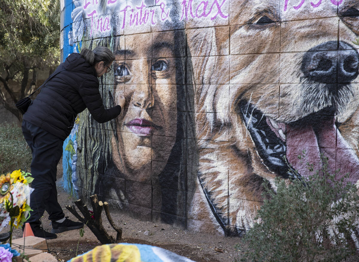 Ljiljana Strbac visits a mural honoring her niece Tintor and her dog, Max, who were both killed ...