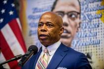 Eric Adams speaks at a news conference at the Queensbridge houses in Long Island City, Queens o ...