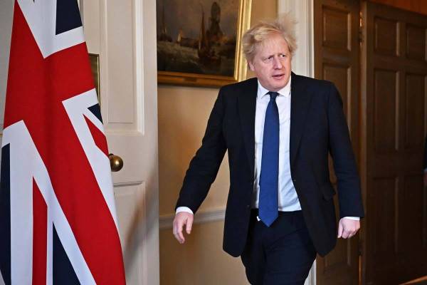 Britain's Prime Minister Boris Johnson arrives to deliver an address on the attack by Russia on ...