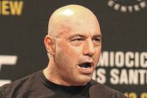 FILE - Joe Rogan is seen during a weigh-in before UFC 211 on Friday, May 12, 2017, in Dallas be ...