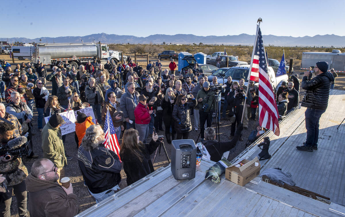 Craig Alan Thomas of Las Vegas sings the National Anthem for truckers of The People’s Co ...