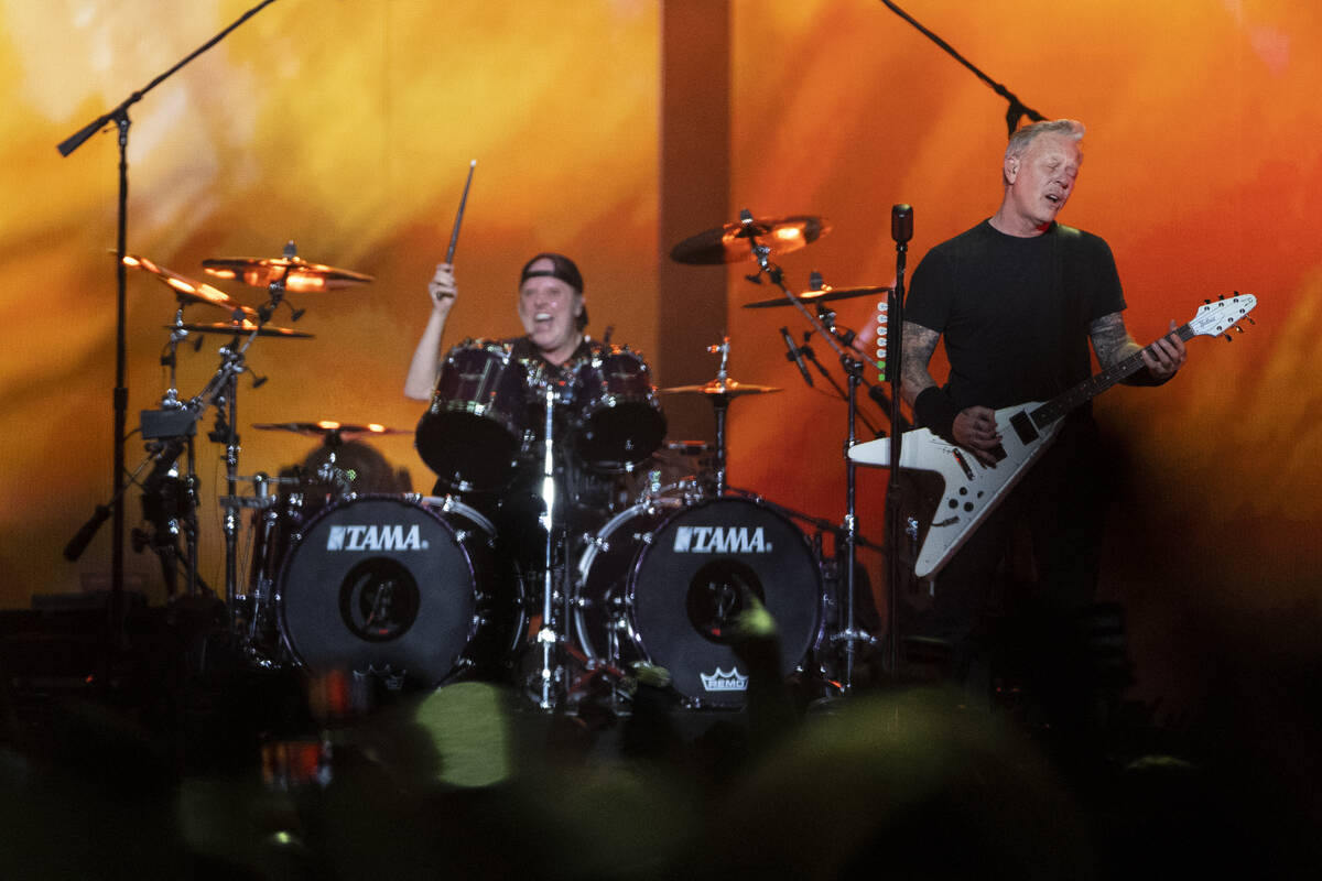 Lars Ulrich, left, and James Hetfield of Metallica perform at Allegiant Stadium in Las Vegas, F ...